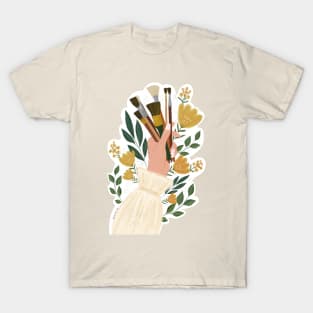 hand holding paint brushes surrounded by flowers sticker T-Shirt